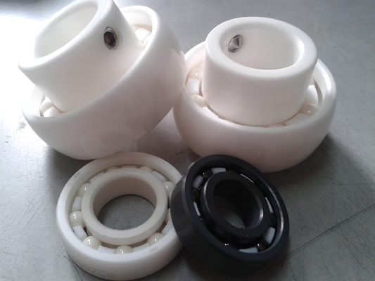 ZrO2 UC205 콘베이어 시스템에서 적응 스레드를 가진 세라믹 삽입 공 베어링 PTFE 케이지